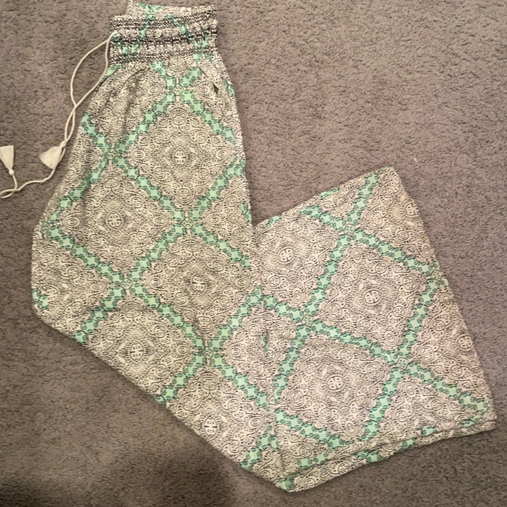 Long, white and green patterned flowy pants